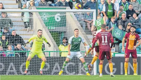  ?? ?? Hibs’ Ryan Porteous (No. 5) scores what would be the only goal of the game