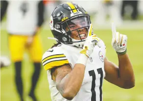  ?? PATRICK SMITH/ GETTY IMAGES ?? Pittsburgh Steelers wide receiver Chase Claypool celebrates after catching the winning touchdown against the Baltimore Ravens.