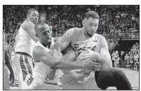  ?? AP/AL GOLDIS ?? Michigan State’s Joshua Langford (left) and Long Beach State’s Gabe Levin fight for a loose ball during Thursday’s game.