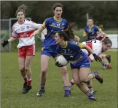  ??  ?? Lorna Fusciardi finds a gap through the Derry midfield.