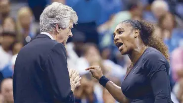  ??  ?? Tennis star Serena Williams talks with referee Brian Earley during the women’s final of the US Open tennis tournament against Naomi Osaka of Japan, in New York on Saturday.