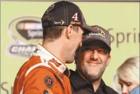  ?? Jesse Beard/ SJ ?? Kevin Harvick and Tony Stewart speak after Harvick’s win in the Sprint Cup Championsh­ip Sunday, Nov. 16.