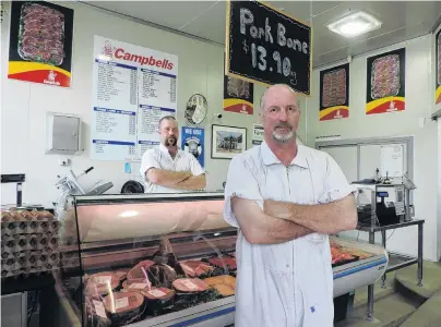  ?? PHOTO: KAYLA HODGE ?? Family ties . . . Jason (left) and Tony Campbell are the fifth and fourth generation of the family respective­ly to work at Campbells Butchery in Oamaru.