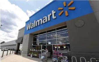 ?? AP FILE ?? OPEN-DOOR POLICY: Walmart settled a lawsuit concerning a worker who became disabled but was not offered an open job suitable for disabled workers at another store, and has changed its policy to match.
