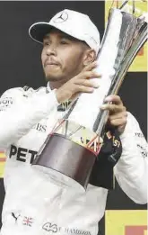  ??  ?? Lewis Hamilton