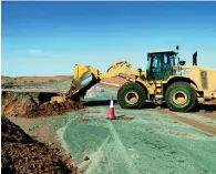  ??  ?? Workers, tankers and pumping machines were deployed to drain out rain water, remove dirt, and repair the damaged roads.