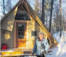 ?? BARBARA YOUNG ?? Susan Riley in front of a four-season ‘tent’ at Lac Philippe. I guess the first question is, Why? Sleeping outside on a frigid winter night sounds more like a special offer from the Marquis de Sade Travel Agency than healthy outdoor recreation. Does...