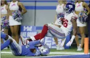  ?? DUANE BURLESON - THE ASSOCIATED PRESS ?? New York Giants wide receiver Darius Slayton (86) is tackled by Detroit Lions cornerback Rashaan Melvin after a 22-yard pass reception for a touchdown during the first half of a game, Sunday, Oct. 27, 2019, in Detroit.