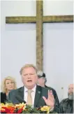 ??  ?? Dan Johnson denies sex-assault allegation from the pulpit of his church Tuesday in Louisville, Kentucky.