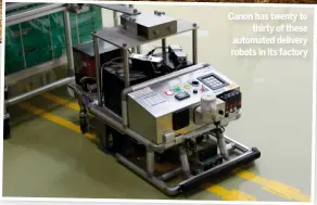  ??  ?? Canon has twenty to thirty of these automated delivery robots in its factory