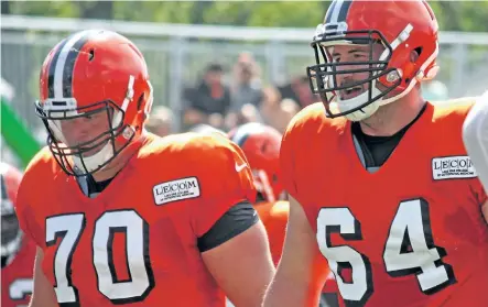  ?? JOHN KRYK/ POSTMEDIA NETWORK ?? New Cleveland Browns Kevin Zeitler, left, and JC Tretter practice at Browns camp on July 29 in Berea, Ohio. The two free-agent blockers could give Cleveland, potentiall­y, one of the foremost offensive lines in the league.