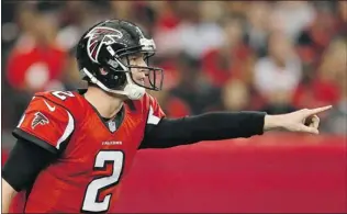  ?? KEVIN C. COX/ GETTY IMAGES ?? Matt Ryan and the Falcons will try to avoid the upset when the Seattle Seahawks visit Atlanta in an NFC playoff game Sunday.