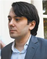  ?? Timothy A. Clary / AFP / Getty Images 2017 ?? Martin Shkreli raised the price of a key drug from $13.50 a pill to $750.