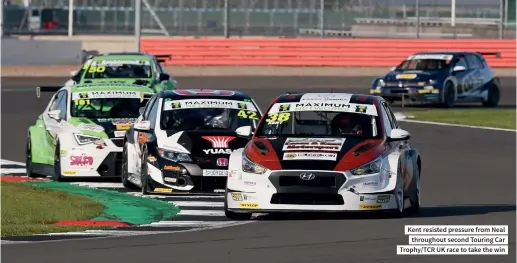  ??  ?? Kent resisted pressure from Neal throughout second Touring Car Trophy/tcr UK race to take the win