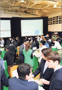  ?? File photo ?? Students from seven high school compete in the Junior Achievemen­t Student Stock Market Exchange Challenge in 2018.