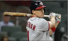  ??  ?? In this April 19, 2017, file photo, Washington Nationals’ Ryan Zimmerman watches his grand slam off Atlanta Braves pitcher Ian
Krol during the eighth inning of a baseball game in Atlanta.