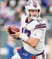  ?? Elsa / Getty Images ?? QB Josh Allen and the Bills (6-3) will look to keep pace with AFC East rival New England (6-4), by beating the Colts on Sunday.