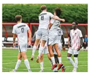  ?? UNIVERSITY OF DAYTON ATHLETICS ?? The University of Dayton team celebrates a goal during an exhibition game against Chicago State on Aug. 16.