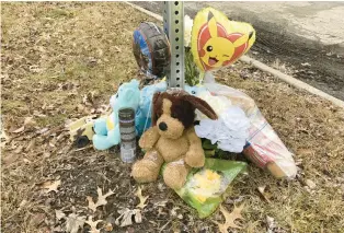  ?? MIKE NOLAN/DAILY SOUTHTOWN ?? A memorial for 7-year-old Connor Kaczmarski near his Park Forest home on Monday. He was struck by a school bus Jan. 20 and later died.