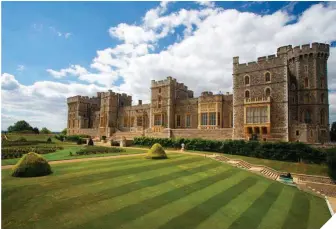  ??  ?? Sobre estas líneas, el castillo de Windsor, en el condado de Berkshire.
A la izquierda, Venus y Adonis, de Tiziano, que según la leyenda acompañó a Felipe II en sus destrezas amatorias con la madura María Tudor.