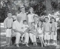  ?? Special to the Democrat-Gazette/KEITH BRANCH ?? Robin and Gary George have been longtime supporters of Arkansas Children’s Hospital. They are pictured with their grandchild­ren (back row, from left) Hayden and Bailey and (front row, from left) Carter, Gary (holding Beckett), Robin (holding Lillian),...