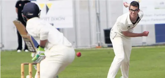  ?? Pictures: RICHARD BIRCH ?? Sean Reilly bowling for Pwllheli against Llandudno opening batsman Robin Smith