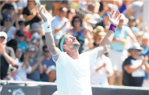  ?? Photo / Getty Images ?? ASB Classic champion Tennys Sandgren couldn’t wait to don his prized Johnny Cash T-shirt after taking out the singles title.