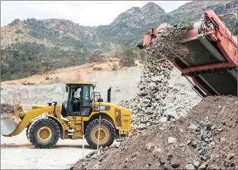  ?? WALDO SWIEGERS ?? A CONVEYOR deposits raw alumnium ore on to a stockpile at a Northam Platinum site. The group produced 256 461 refined ounces for an interim period, representi­ng a healthy increase of 4.1 percent. I Bloomberg
