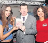  ??  ?? Generous gesture Edward Philips of Ingen Technical Services kindly donated his £200 winnings to the charity