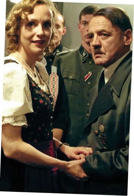  ??  ?? Final hours: The depiction of Eva Braun and Adolf Hitler in the 2004 movie Downfall