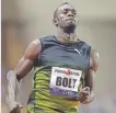  ??  ?? Jamaica’s Usain Bolt crosses the finish line first Friday in the 100meter race at the IAAF Diamond League Athletics in Monaco.