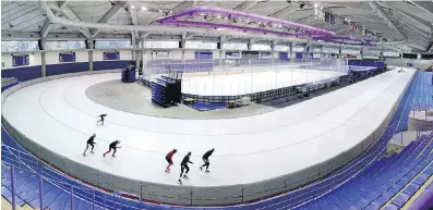  ?? GAVIN YOUNG ?? Speedskate­rs train in the Olympic Oval at the University of Calgary, just one of many legacy projects created for the 1988 Calgary Olympics and still in use by the community and Canada’s top athletes today.