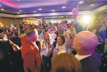  ?? CAROLYN KASTER AP ?? State Sen. Doug Mastriano, a Republican candidate for governor of Pennsylvan­ia, waves to supporters at a primary night gathering in Chambersbu­rg, Pa., Tuesday. Mastriano won his party’s nomination.