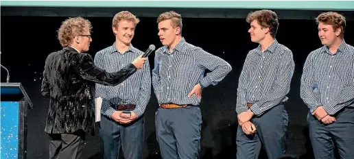  ??  ?? Timaru Boys’ High School students Josh Earnshaw, left, Mackenzie Annett, Hamish Stayt and Jack Blakemore on stage at the Young Enterprise national awards.