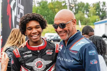  ?? CONTRIBUTE­D ?? Force Indy/Pabst Racing driver Myles Rowe (left) and Rod Reid, team principal of Force Indy, who is also president and chief instructor of NXG Youth Motorsport­s, plan to host a contingent of 50 Dayton kids Saturday at Indianapol­is Motor Speedway.