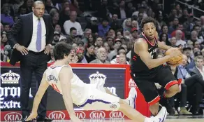  ?? JAE C. HONG / THE ASSOCIATED PRESS ?? Kyle Lowry and the Toronto Raptors have put the toughest travel behind them already in an unusual start to the regular-season schedule.