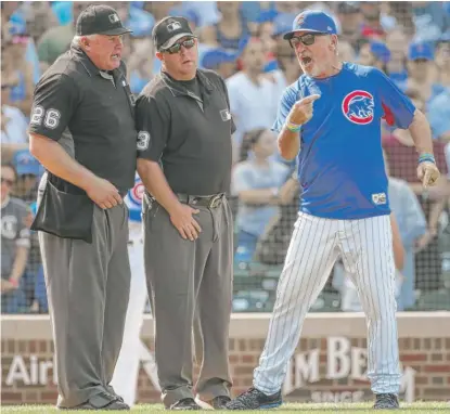  ?? AP ?? Joe Maddon was ejected in the seventh for arguing an interferen­ce call against Willson Contreras, who was running out a grounder.