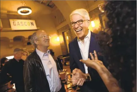  ?? CAROLYN COLE Los Angeles Times ?? GEORGE GASCÓN, a former San Francisco D.A. and LAPD assistant chief, meets with supporters Tuesday night at Union Station.