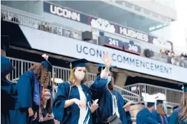  ??  ?? Saturday’s commenceme­nt kicked off five days of in-person graduation ceremonies for UConn.