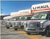  ?? STAFF PHOTO BY DAVE FLESSNER ?? U-Haul trucks line a Hixson Pike facility — one of 20,000 locations across the nation. U-Haul is the most popular moving truck rental company in the business and last year the company said Tennessee had the most incoming of moves of any U.S. state.
