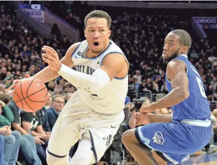  ?? ERIC HARTLINE/USA TODAY SPORTS ?? Villanova’s Jalen Brunson, driving past Seton Hall’s Khadeen Carrington, averages 19 points.