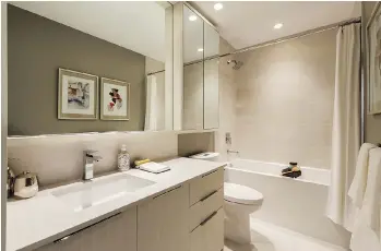  ??  ?? Bathrooms will feature polished stone countertop­s, porcelain sinks and polished chrome faucets.