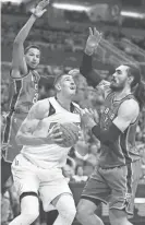  ?? ROB SCHUMACHER/AZCENTRAL SPORTS ?? Oklahoma City Thunder center Steven Adams guards Suns center Alex Len during Friday night’s game at Talking Stick Resort Arena.