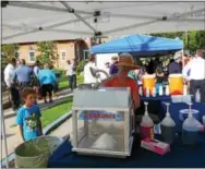  ??  ?? There was plenty for kids to eat during National Night Out Tuesday in Kennett Square.