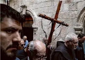  ?? Leo Correa/associated Press ?? Christians walk the Way of the Cross procession that commemorat­es Jesus Christ’s crucifixio­n on Good Friday in the Old City of Jerusalem.