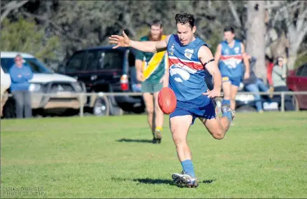  ??  ?? Daniel Maher sends the ball forward on Saturday.