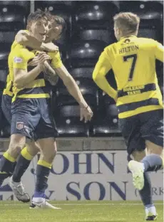  ??  ?? 0 Ruari Paton celebrates after scoring Stranraer’s winner.