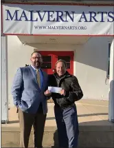  ?? SUBMITTED PHOTO ?? Glen Pierson, vice president and financial center manager for Malvern Bank’s Malvern financial center, presents a check to Danny Fruchter, executive director of Malvern Arts, which was one of four area nonprofits to receive a donation from Malvern Bank from its monthly ATM fee revenue.