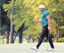  ?? AP FILE ?? In this Aug. 12 photo, Brooks Koepka celebrates after making a birdie putt on the 16th green during the final round of the PGA Championsh­ip.