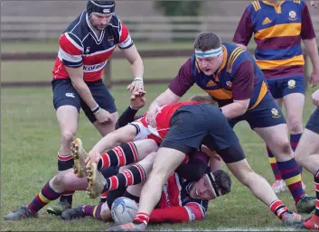  ??  ?? Wicklow battle to retain possession during the Towns Cup quarter-final against Skerries.